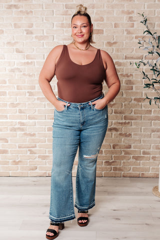 Isla Mid Rise Distressed Released Hem Bootcut Jeans-Jeans-Ave-Motis & Co Boutique, Women's Fashion Boutique in Carthage, Missouri