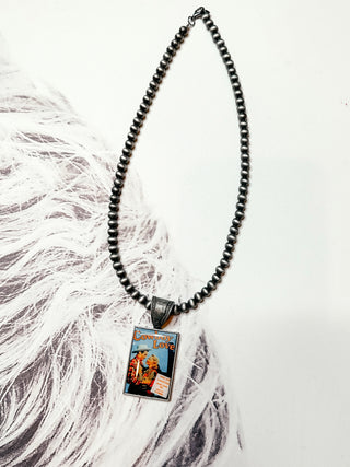 Vintage Cowboy Poster Necklace-Necklaces-Western Elite-Motis & Co Boutique, Women's Fashion Boutique in Carthage, Missouri