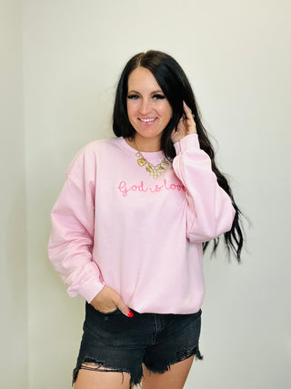 God is Love Embroidered Pink Sweatshirt-graphic Sweatshirt-Dash Forward-Motis & Co Boutique, Women's Fashion Boutique in Carthage, Missouri