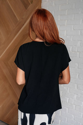 Frequently Asked Questions V-Neck Top in Black-Tops-Ave Shops-Motis & Co Boutique, Women's Fashion Boutique in Carthage, Missouri