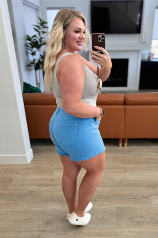 Celeste Mid Rise Shield Pocket Cutoff Shorts in Sky Blue-Denim-Ave Shops-Motis & Co Boutique, Women's Fashion Boutique in Carthage, Missouri
